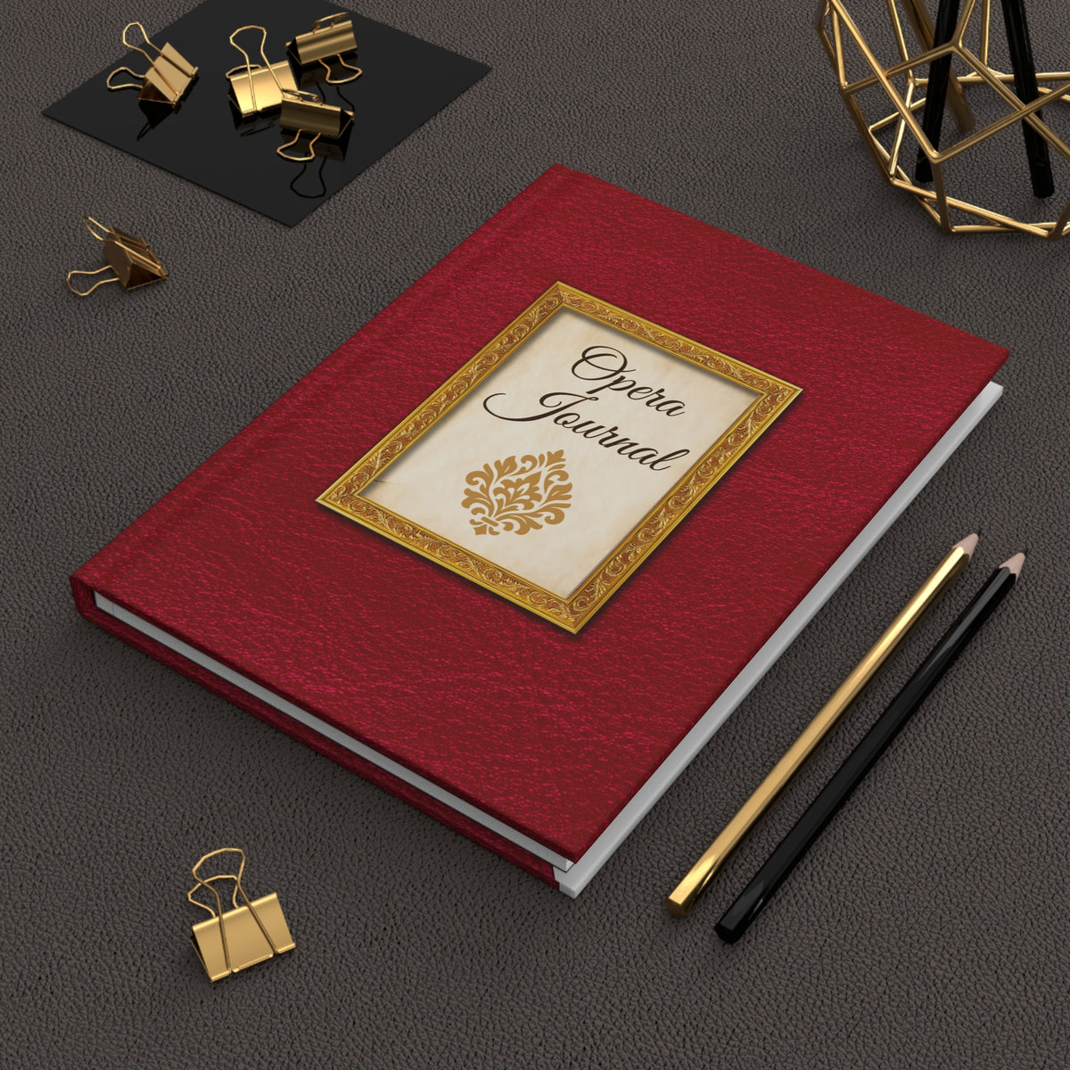 The Opera Journal with a read leather look cover on a desktop. Ideal gift for an opera lover