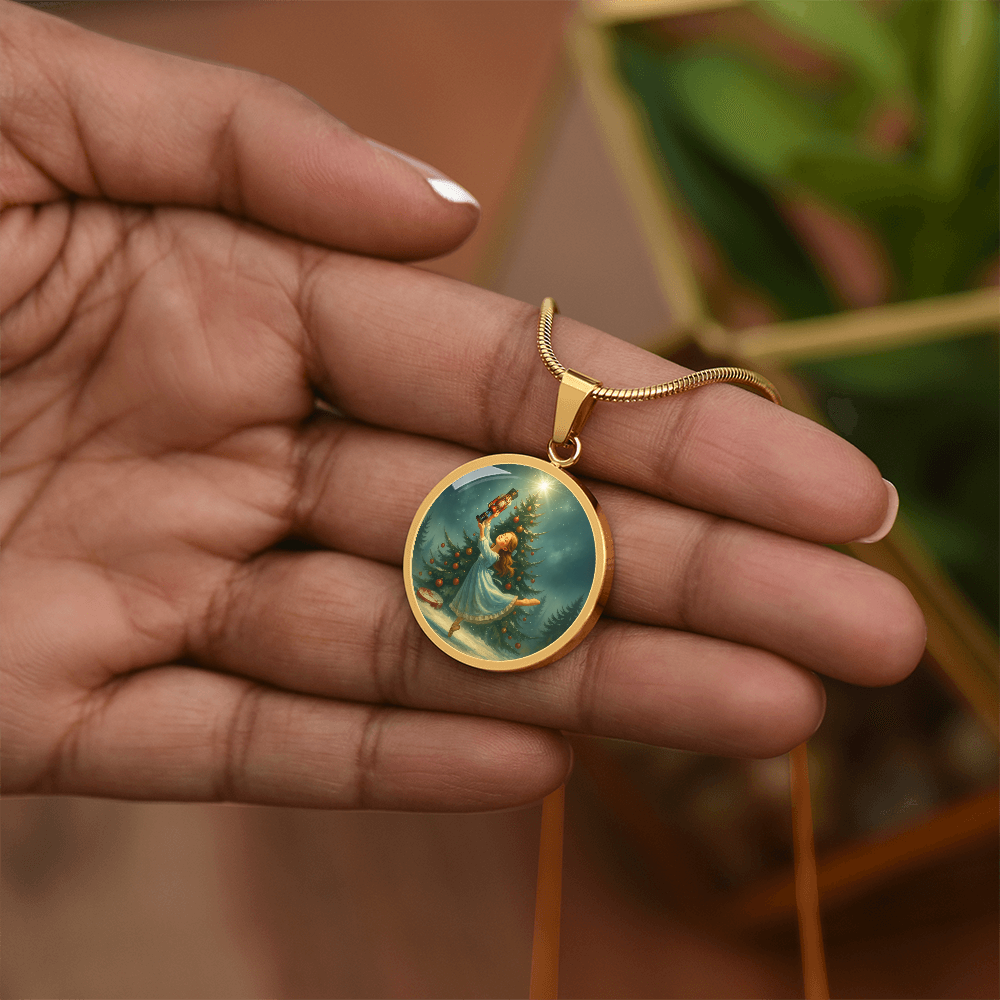 Gold finish Clara Necklace held in hand
